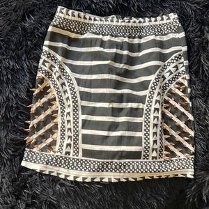 Black and white denim mini skirt with copper studs